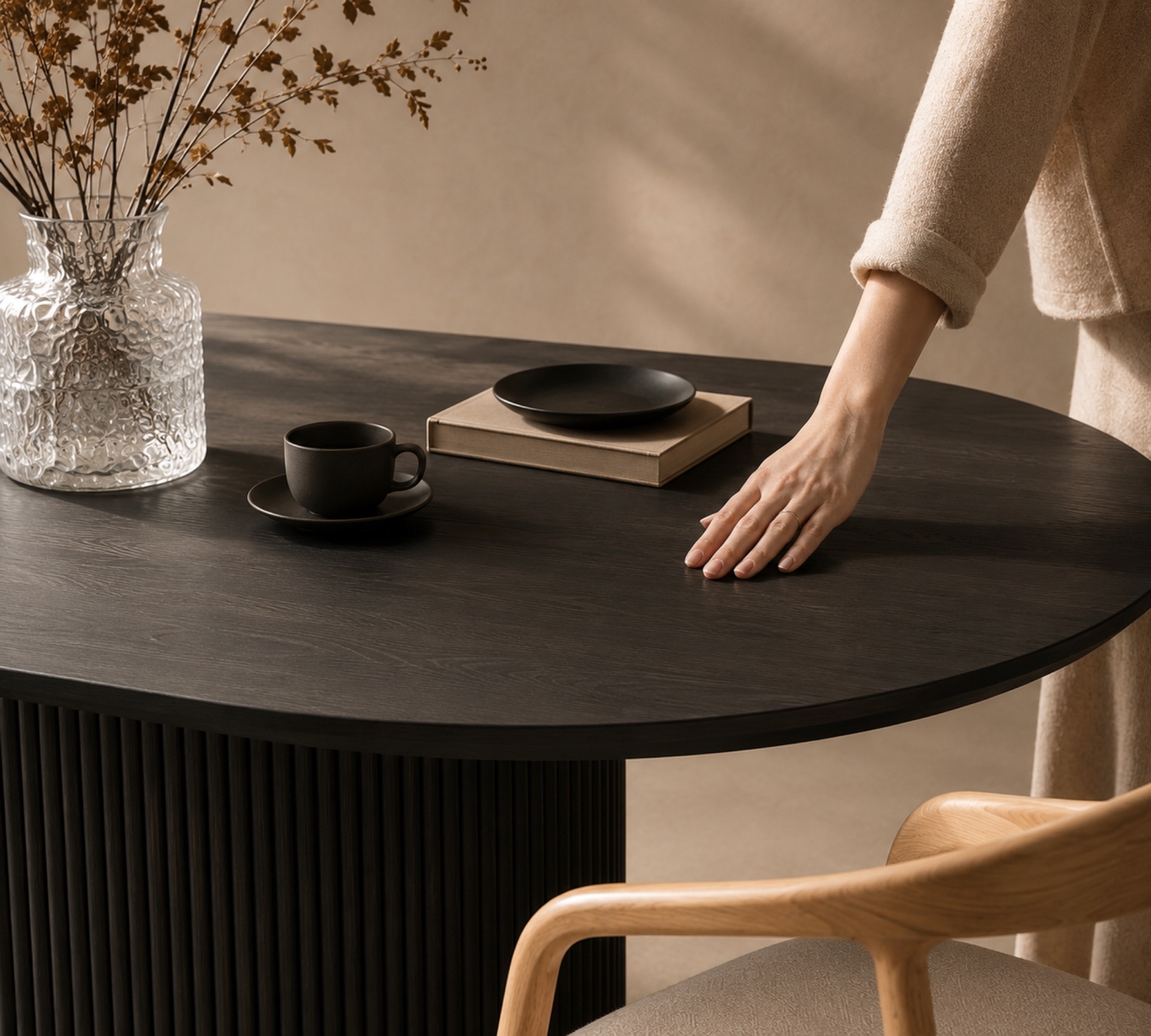 Close-up of a dark oval dining table
