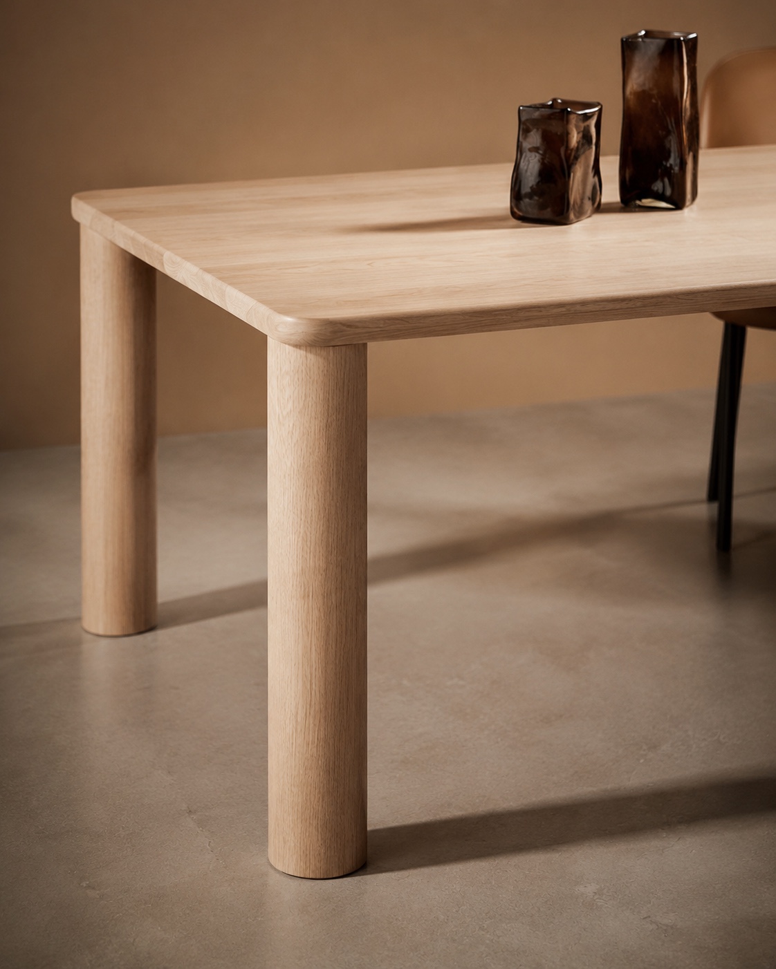 Close-up of a light oak dining table